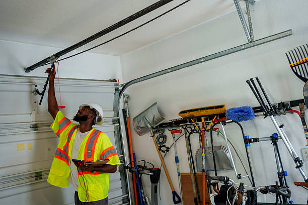 Professional Garage Door Roller Replacement technician working in Edmore, MI